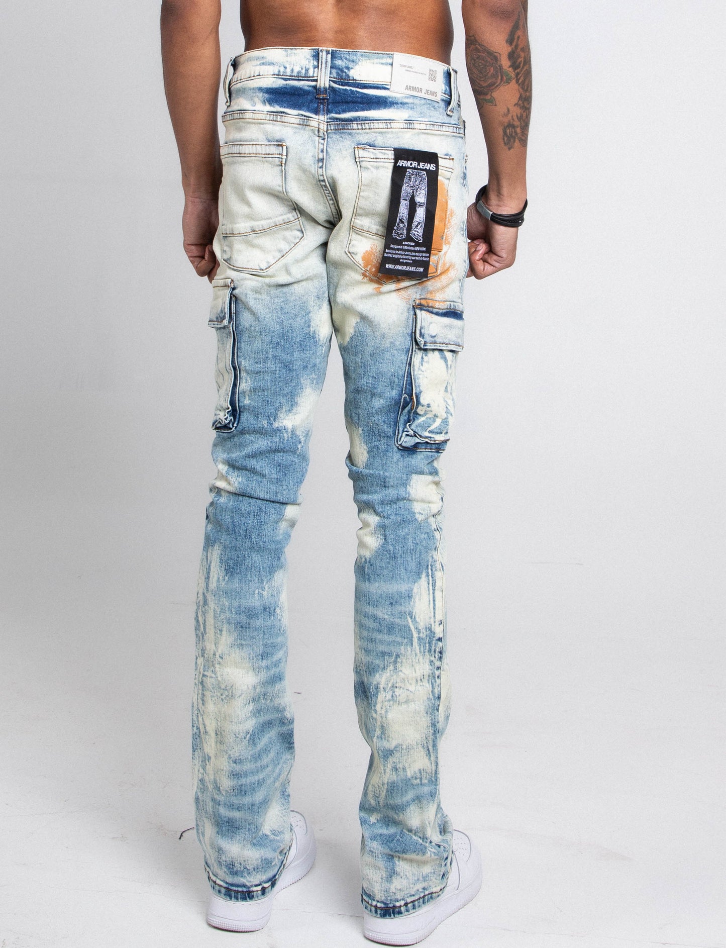 AJ29SK GREY/WHITE WASH STACKED CARGO JEANS with splash paint and cargo design, showcasing back view with mid-rise waist and stretchy fabric.