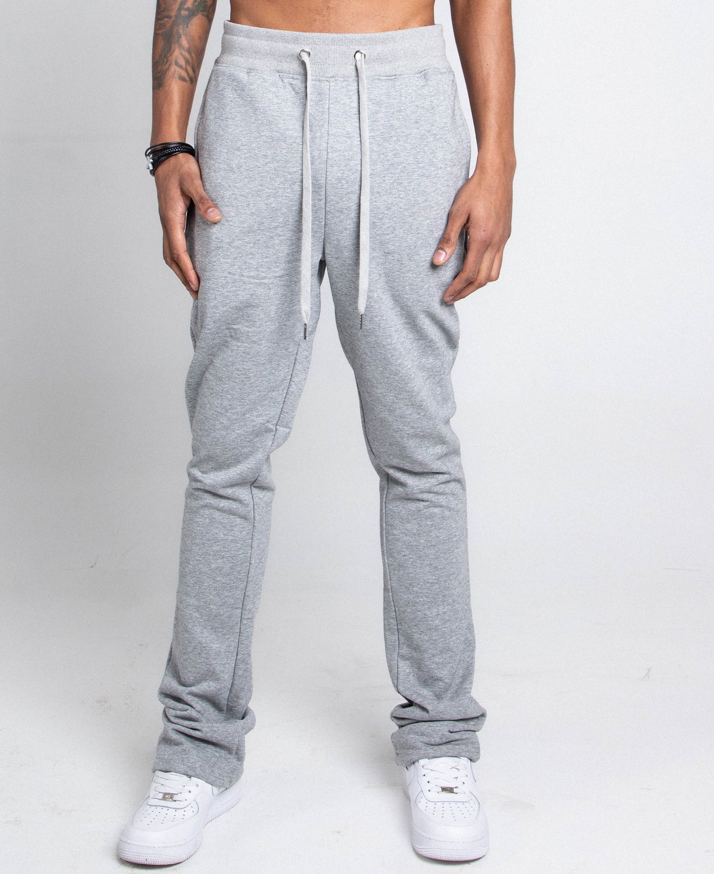 M5690-AJSKP MULTI-COLOR STACKED SWEATPANTS with adjustable drawstrings, elastic waistband, and pockets, front view.