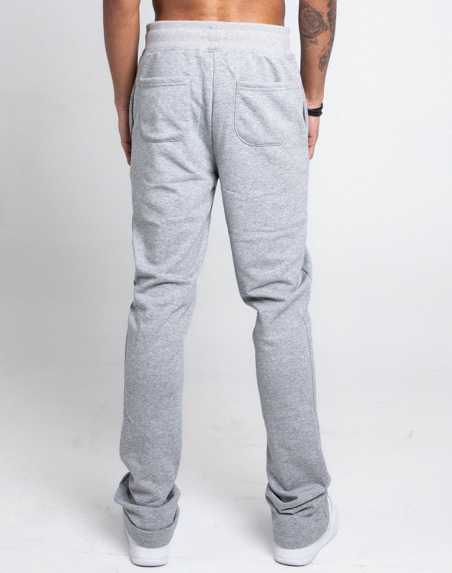 Back view of M5690-AJSKP MULTI-COLOR STACKED SWEATPANTS with pockets