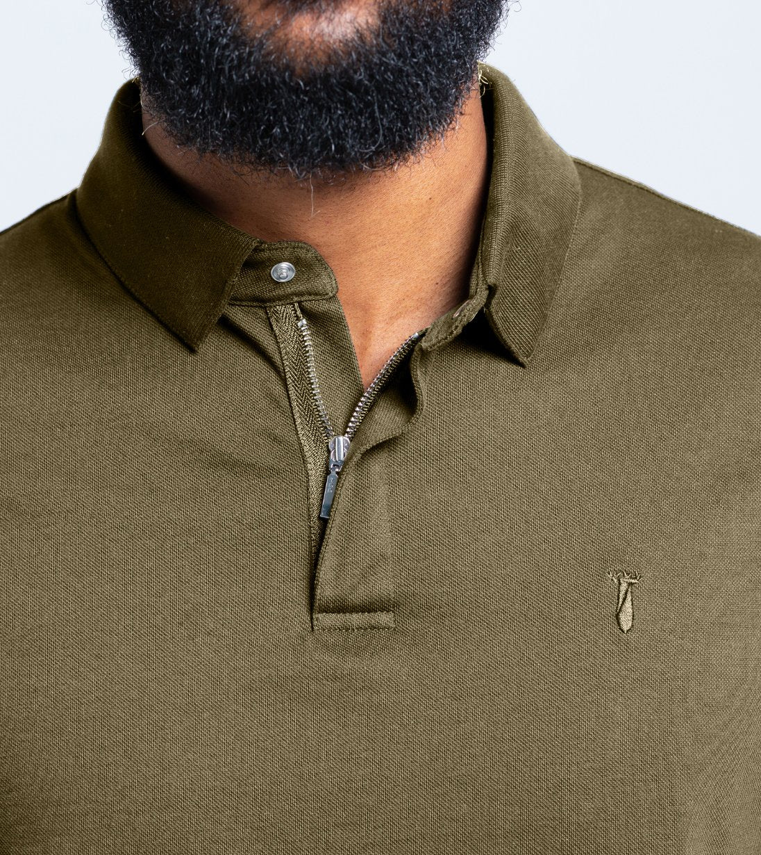 Man wearing olive Short Sleeve Perfect Polo with StaySharp™ Collar