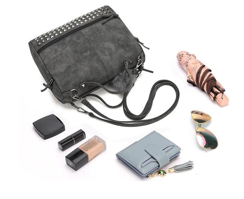 Rustic Charm Leather Shoulder Bag – Stylish Cowgirl Handbag with accessories including sunglasses, wallet, umbrella, and cosmetics.