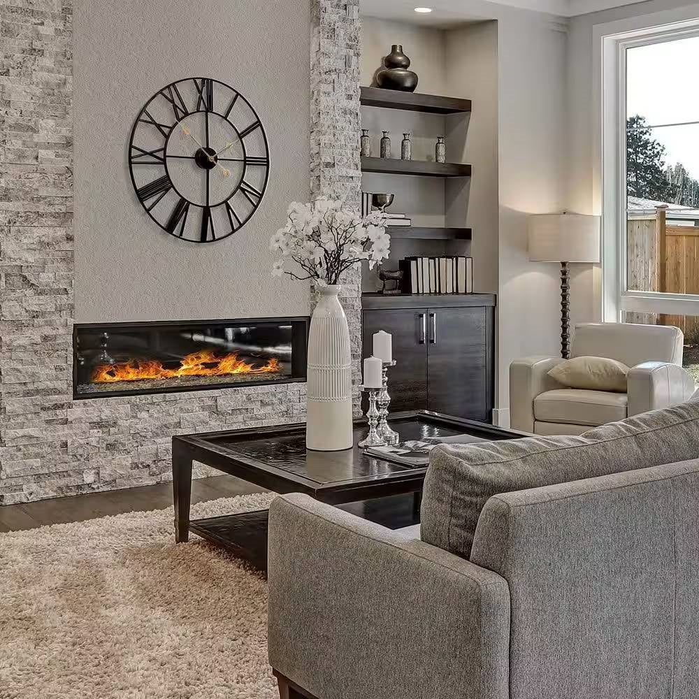 Living room featuring Round 24-inch Black Metal Roman Numeral Wall Clock with Gold Hands above fireplace, modern decor