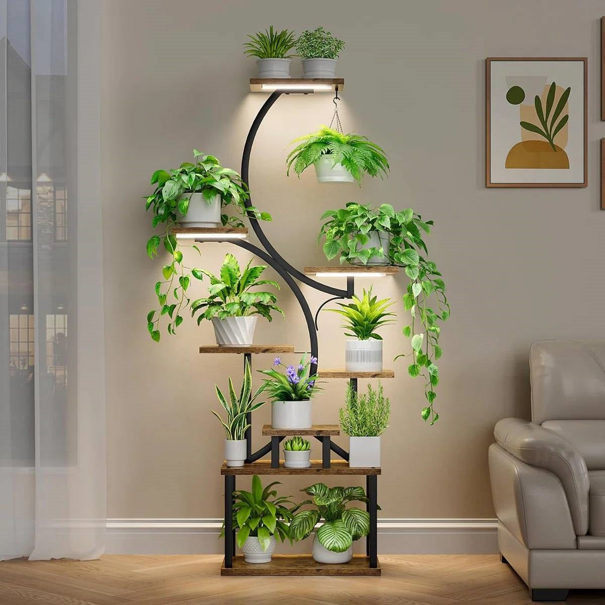 Indoor Plant Stand with Black Metal Frame and Wood Finish Shelves with plants and grow lights, 8-tier space-saving design.