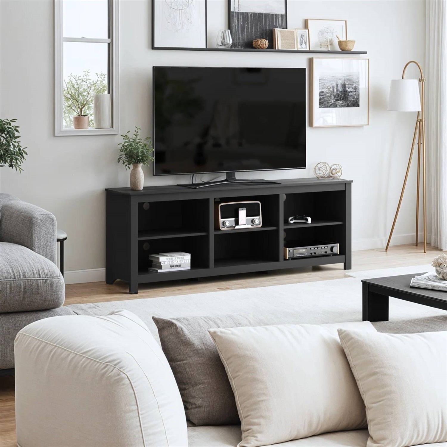 Farmhouse TV Stand in Black Wood Finish - for TVs up to 70-inch in a modern living room setting.