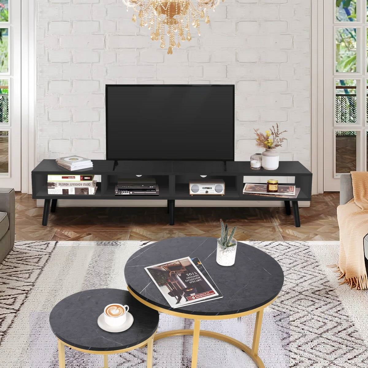 Mid-Century Modern Style TV Stand in Black Wood Finish - for TVs up to 65-inch with open shelves in a stylish living room setting