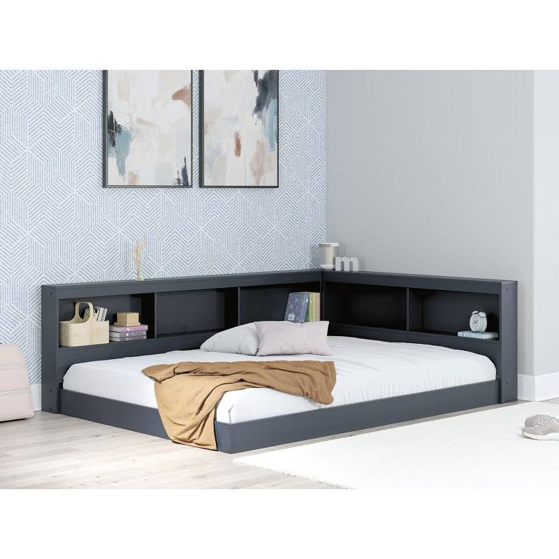Twin size Blue Wooden Corner Storage Bed with Bookcase Headboard and USB Ports, ideal for small spaces, with integrated shelves.