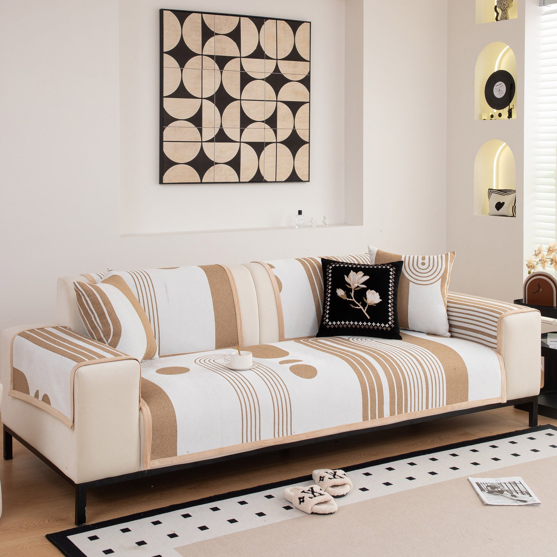 Modern Geometric Sofa Cover - Thick Woven, Pet Friendly, Stylish Couch Protector with bold curves and circular patterns on a white sofa.
