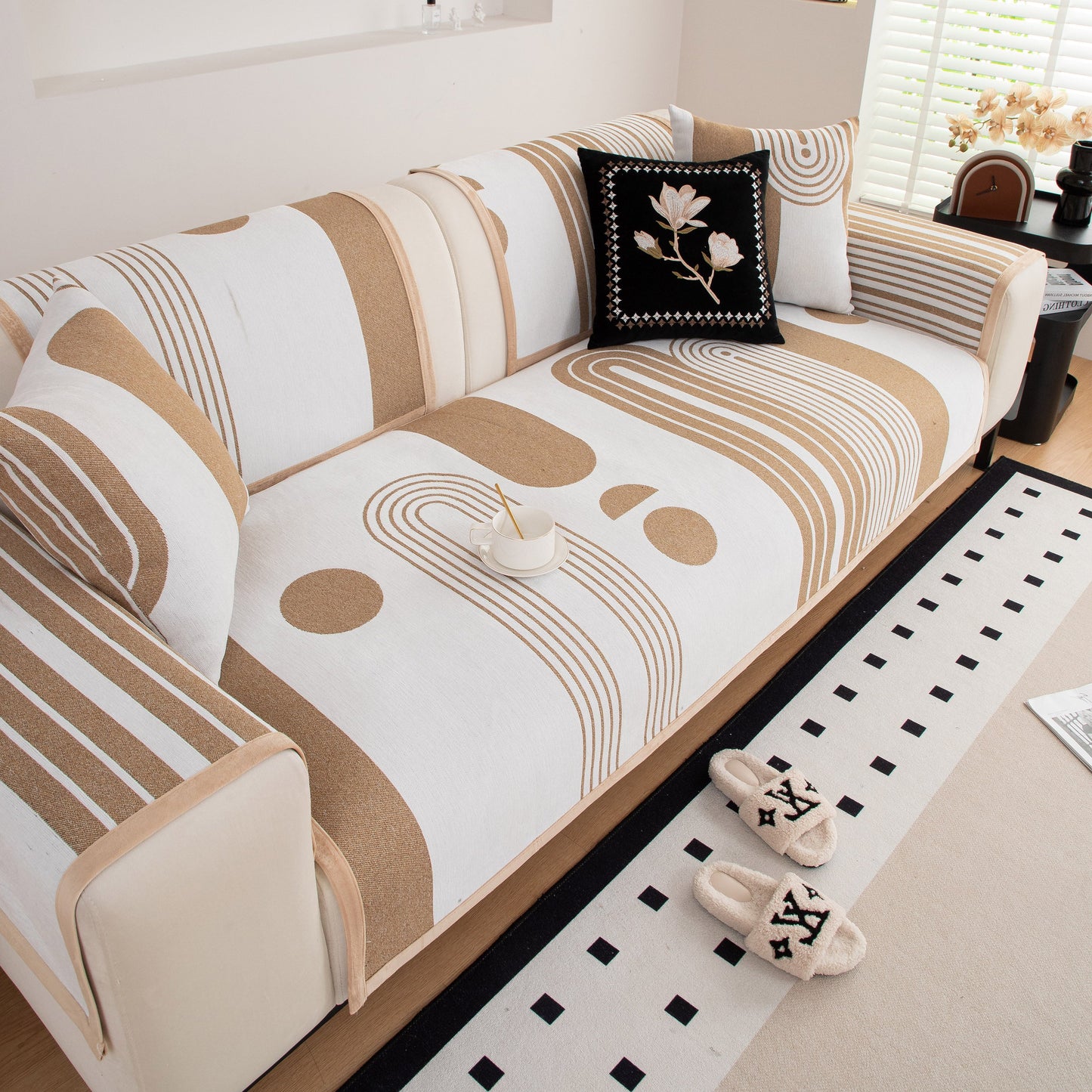 Modern Geometric Sofa Cover - Thick Woven, Pet Friendly, Stylish Couch Protector with bold curves and circular patterns in living room.
