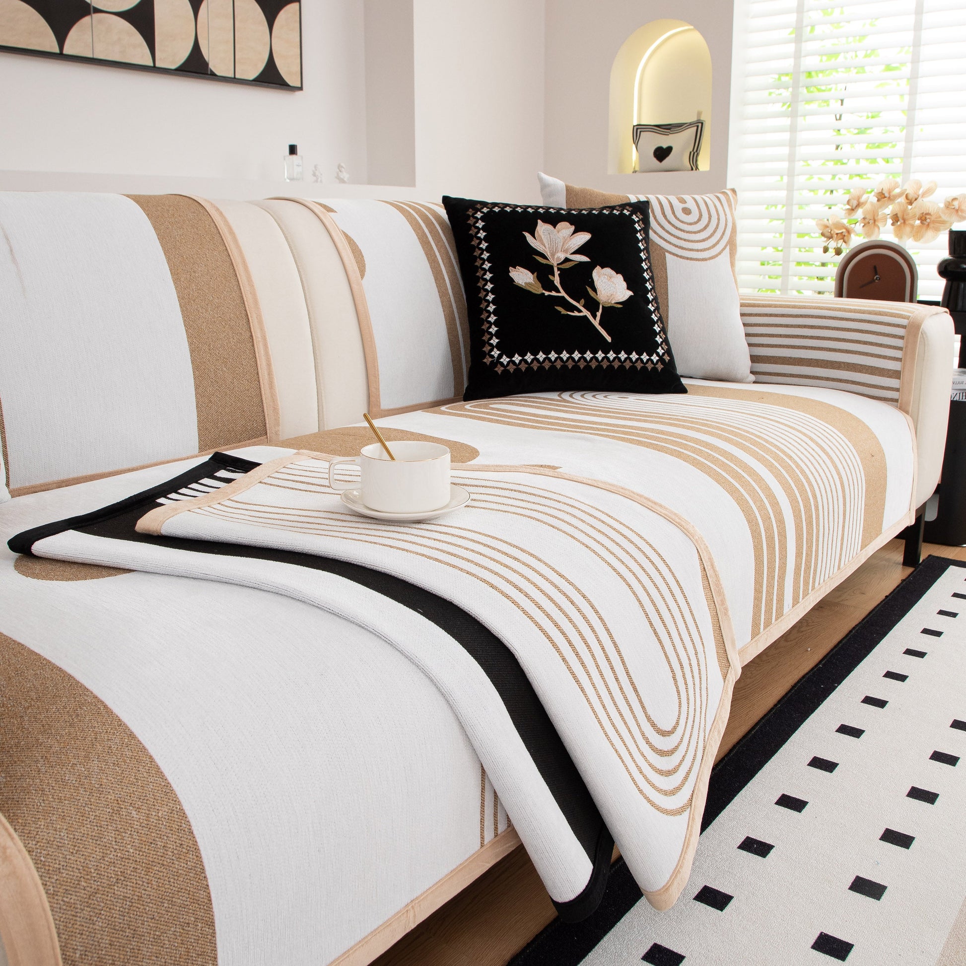 Modern Geometric Sofa Cover - Thick Woven, Pet Friendly, Stylish Couch Protector on white sofa with bold curves and patterns.
