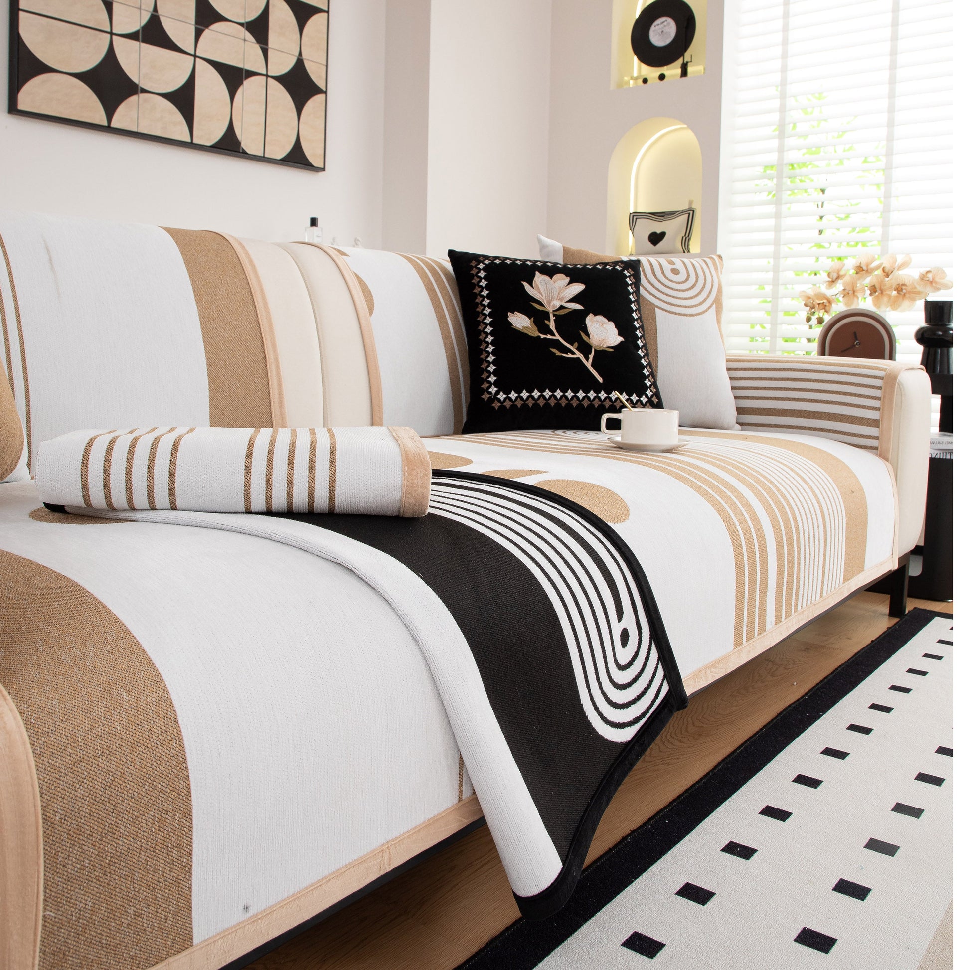 Modern Geometric Sofa Cover - Thick Woven, Pet Friendly, Stylish Couch Protector on light cream sofa with black accents.