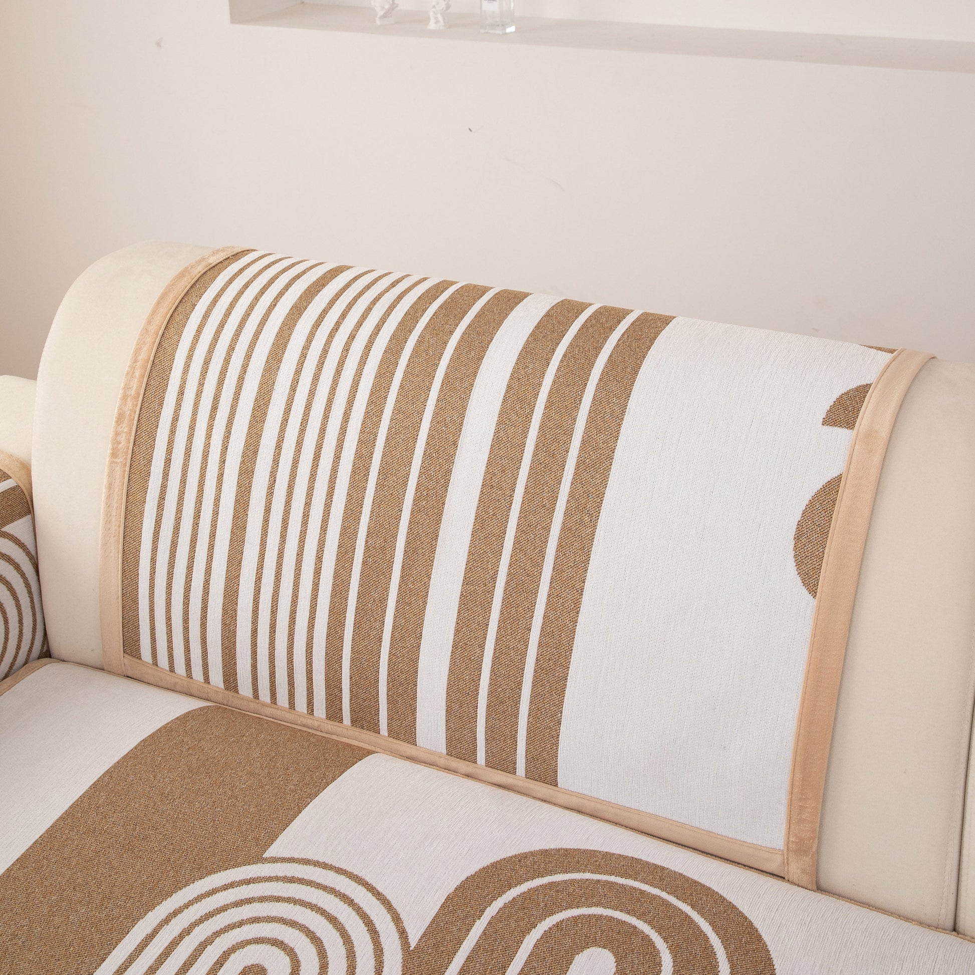 Modern Geometric Sofa Cover - Thick Woven, Pet Friendly, Stylish Couch Protector with bold curved patterns on beige background.