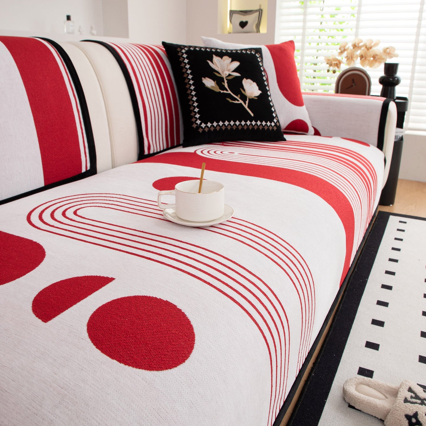 Modern Geometric Sofa Cover - Thick Woven, Pet Friendly, Stylish Couch Protector featuring red and white curved designs with anti-slip backing.