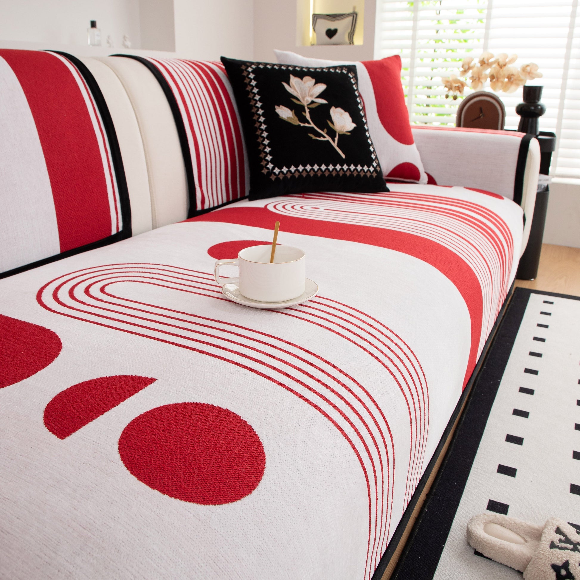 Modern Geometric Sofa Cover - Thick Woven, Pet Friendly, Stylish Couch Protector featuring red and white curved designs with anti-slip backing.