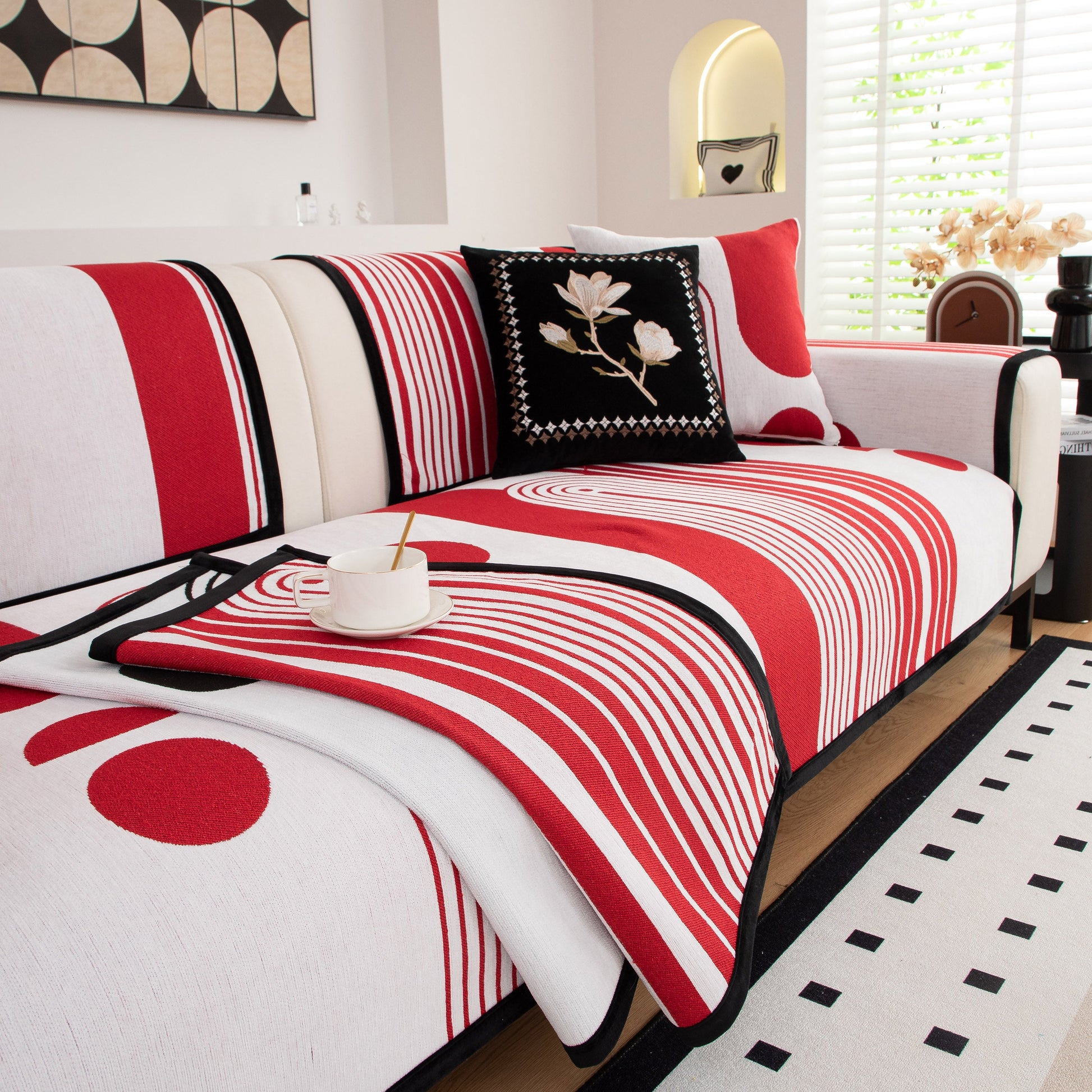 Modern Geometric Sofa Cover - Thick Woven, Pet Friendly, Stylish Couch Protector in red and white patterns on living room sofa.