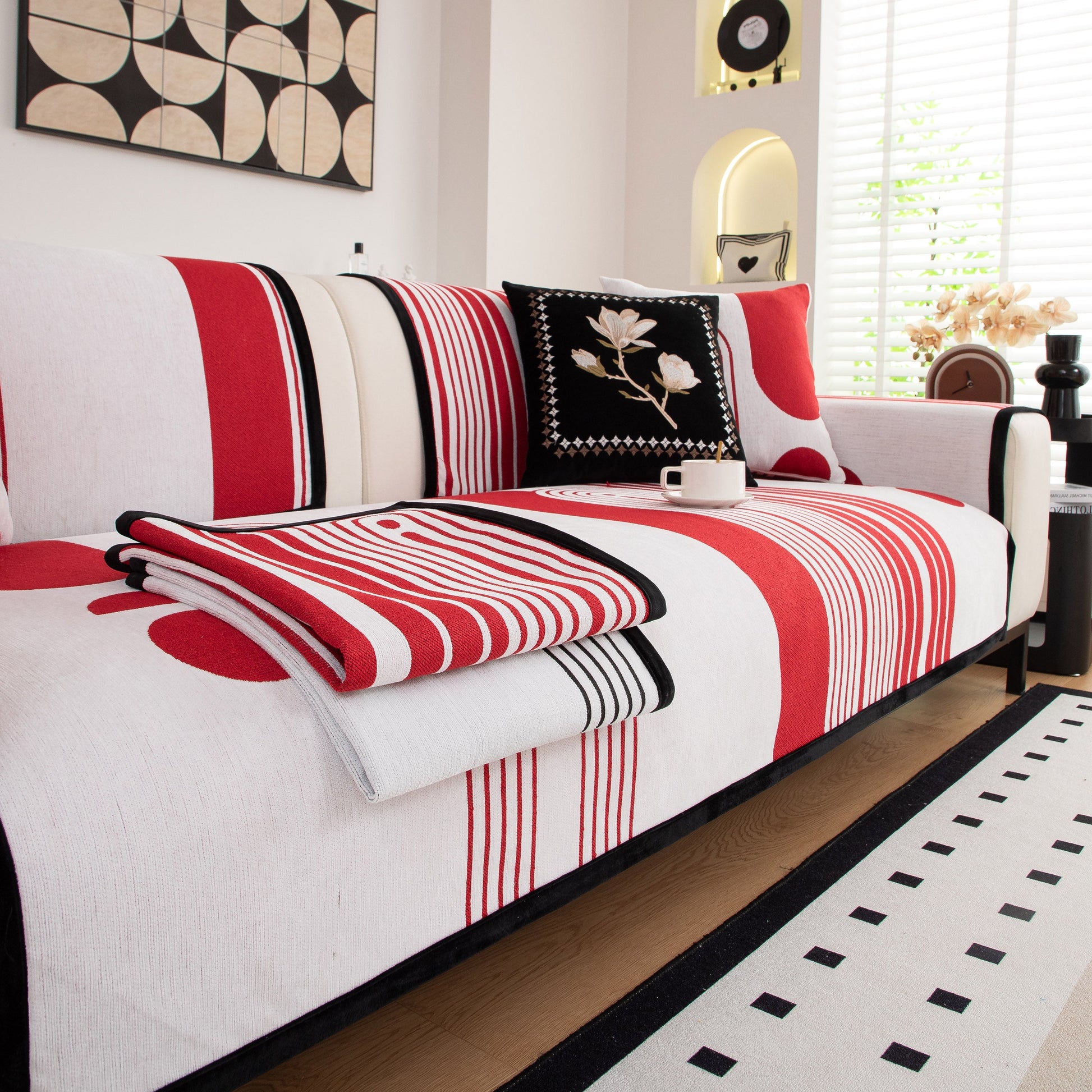 Modern Geometric Sofa Cover - Thick Woven, Pet Friendly, Stylish Couch Protector in red and white geometric design on a sofa.