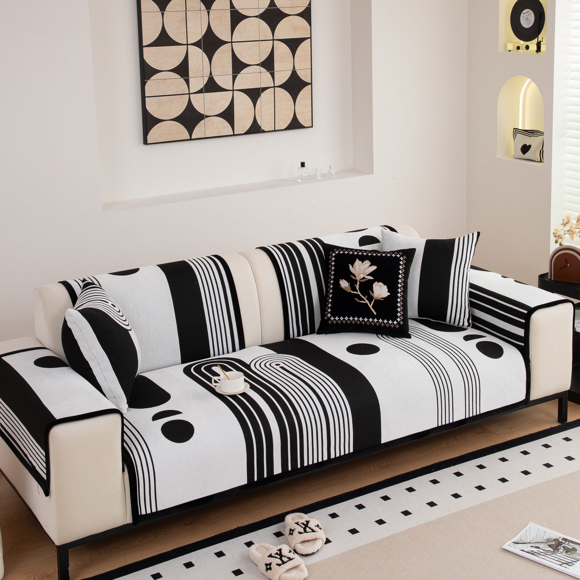 Modern Geometric Sofa Cover - Thick Woven, Pet Friendly, Stylish Couch Protector on a couch, featuring bold curves and patterns.