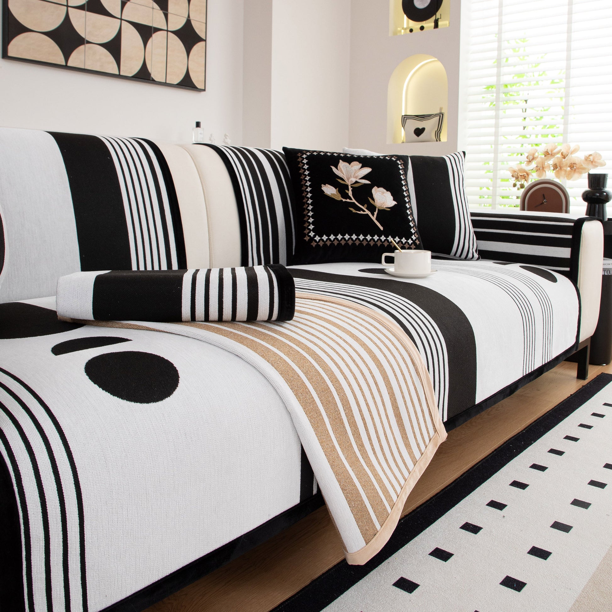 Modern Geometric Sofa Cover - Thick Woven, Pet Friendly, Stylish Couch Protector with bold curves and circular patterns in black and white.