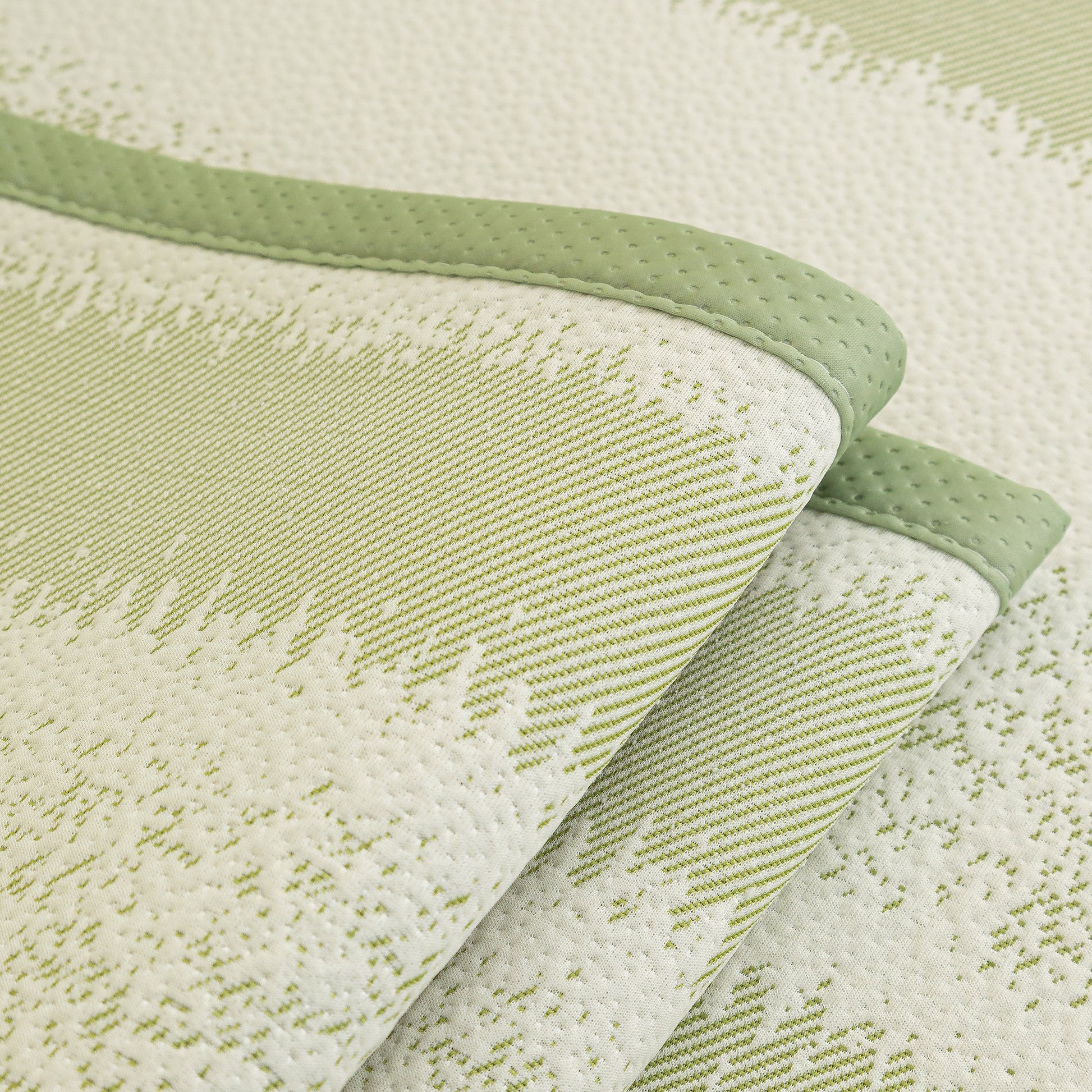 Close-up of a green and white Striped Non-Slip Cooling Couch Cover, Summer Couch Pads for Seat Back Armrest