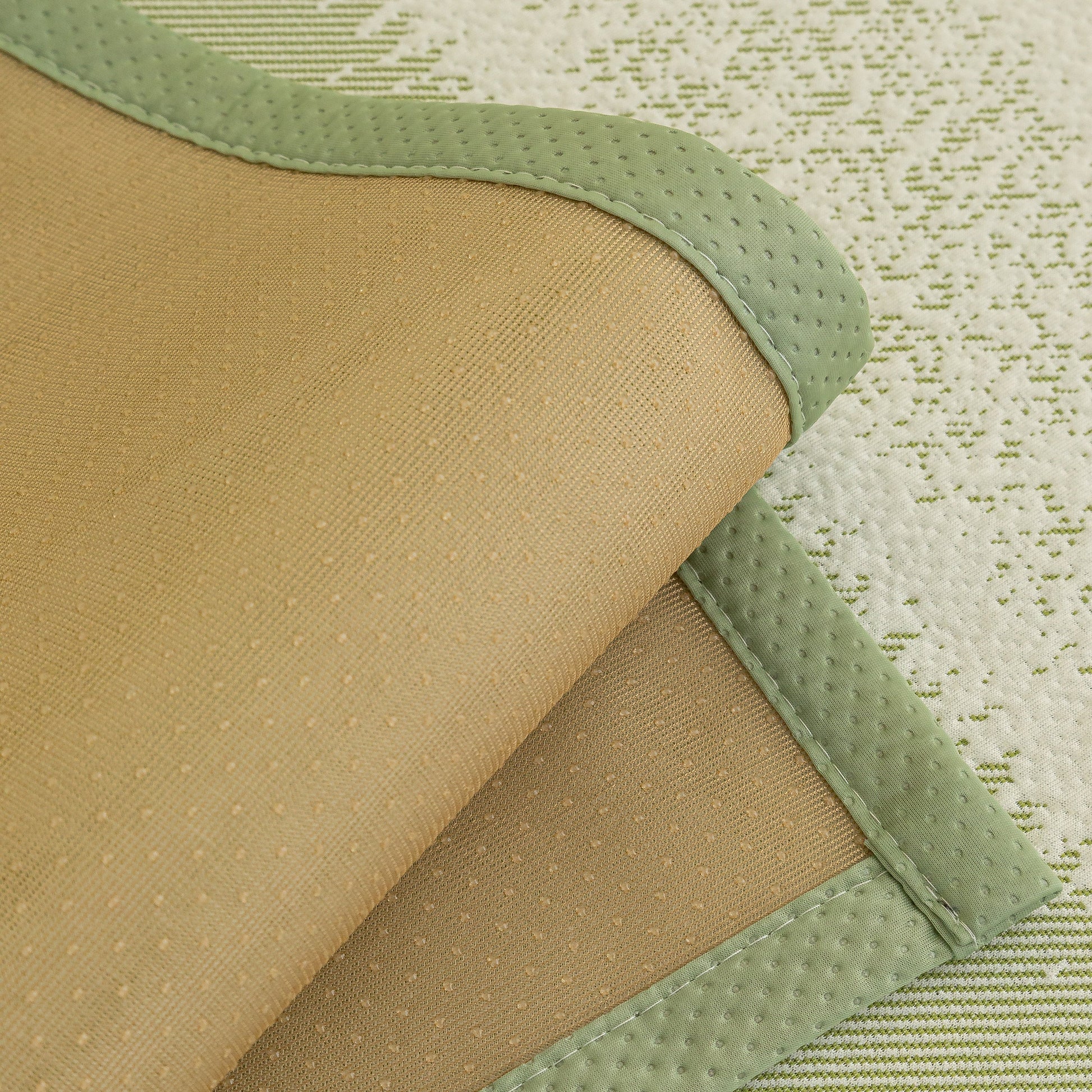 Close-up of Striped Non-Slip Cooling Couch Cover, Summer Couch Pads for Seat Back Armrest featuring ice silk fabric and anti-slip design.