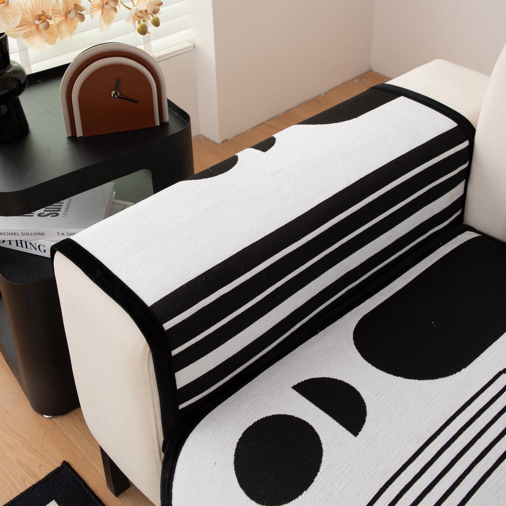 Modern Geometric Sofa Cover - Thick Woven, Pet Friendly, Stylish Couch Protector in black and white pattern with anti-slip backing.