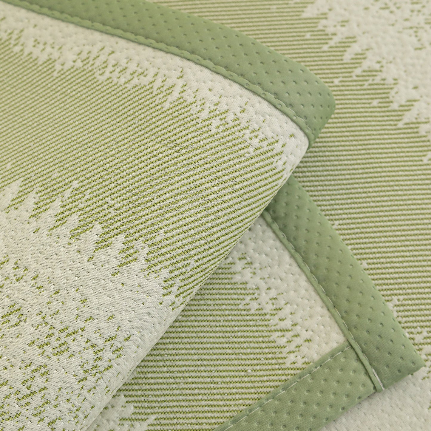 Close-up of Striped Non-Slip Cooling Couch Cover, Summer Couch Pads for Seat Back Armrest with anti-slip backing.