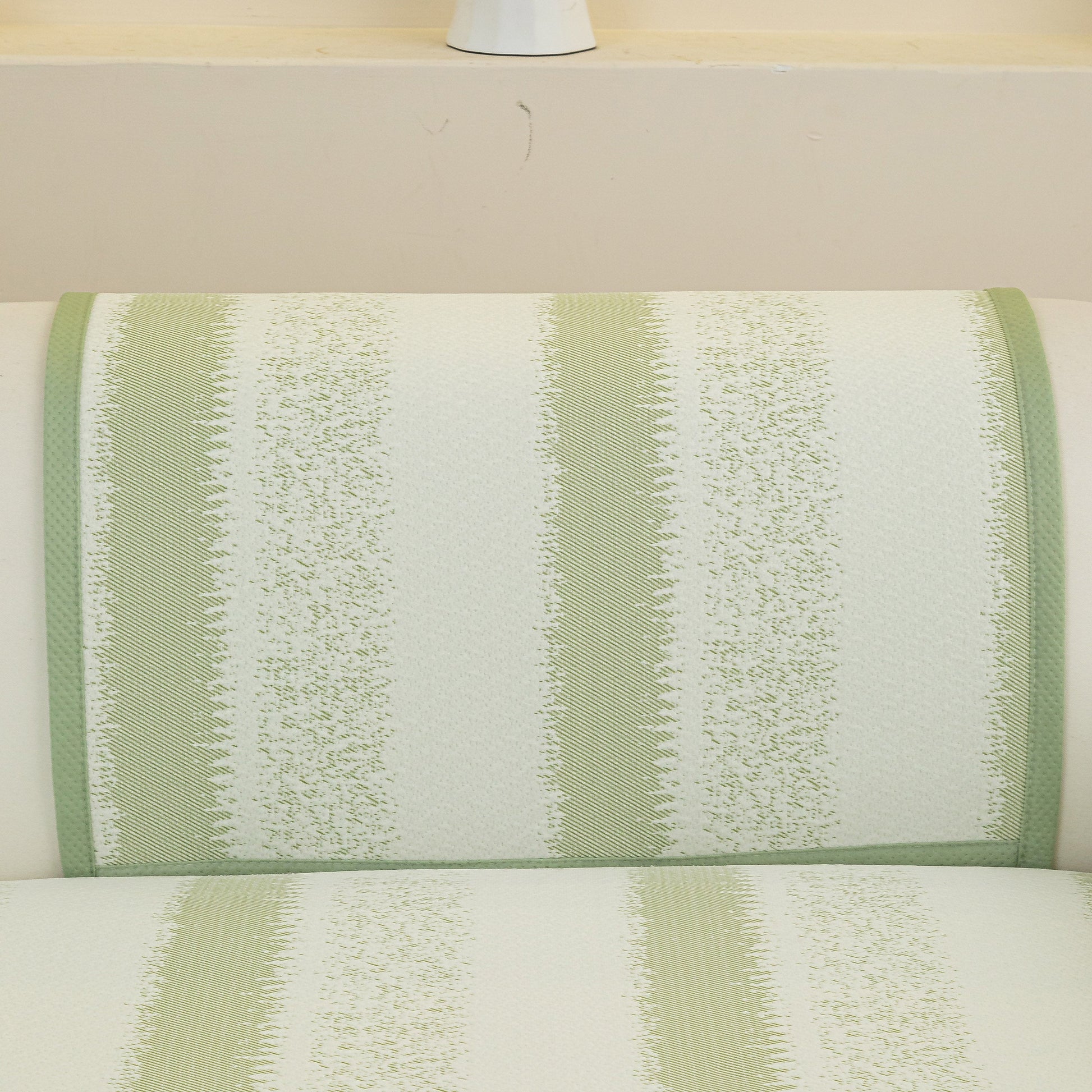 Striped Non-Slip Cooling Couch Cover, Summer Couch Pads for Seat Back Armrest with green and white pattern on sofa back.