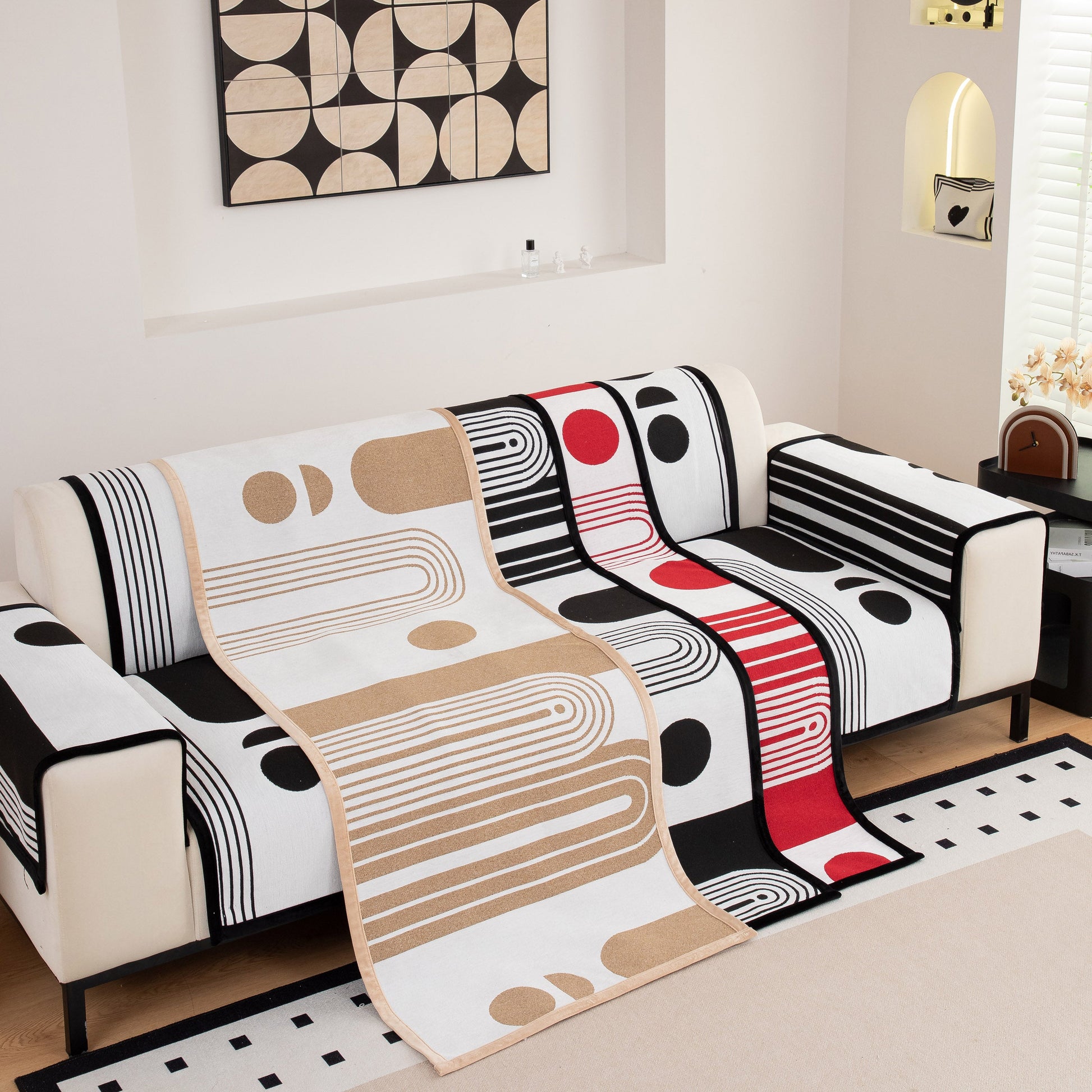Modern Geometric Sofa Cover - Thick Woven, Pet Friendly, Stylish Couch Protector on a white sofa with bold patterns.