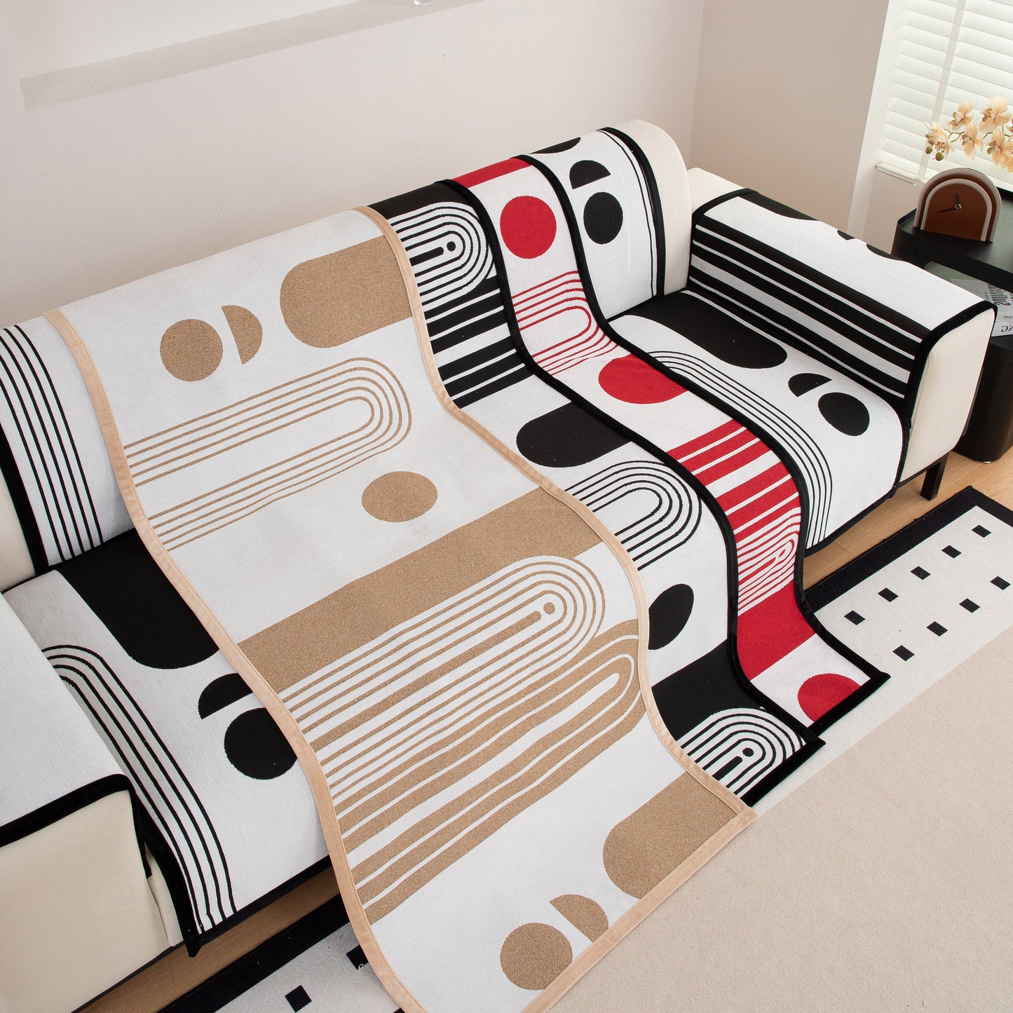 Modern Geometric Sofa Cover - Thick Woven, Pet Friendly, Stylish Couch Protector with bold curves and circular patterns.