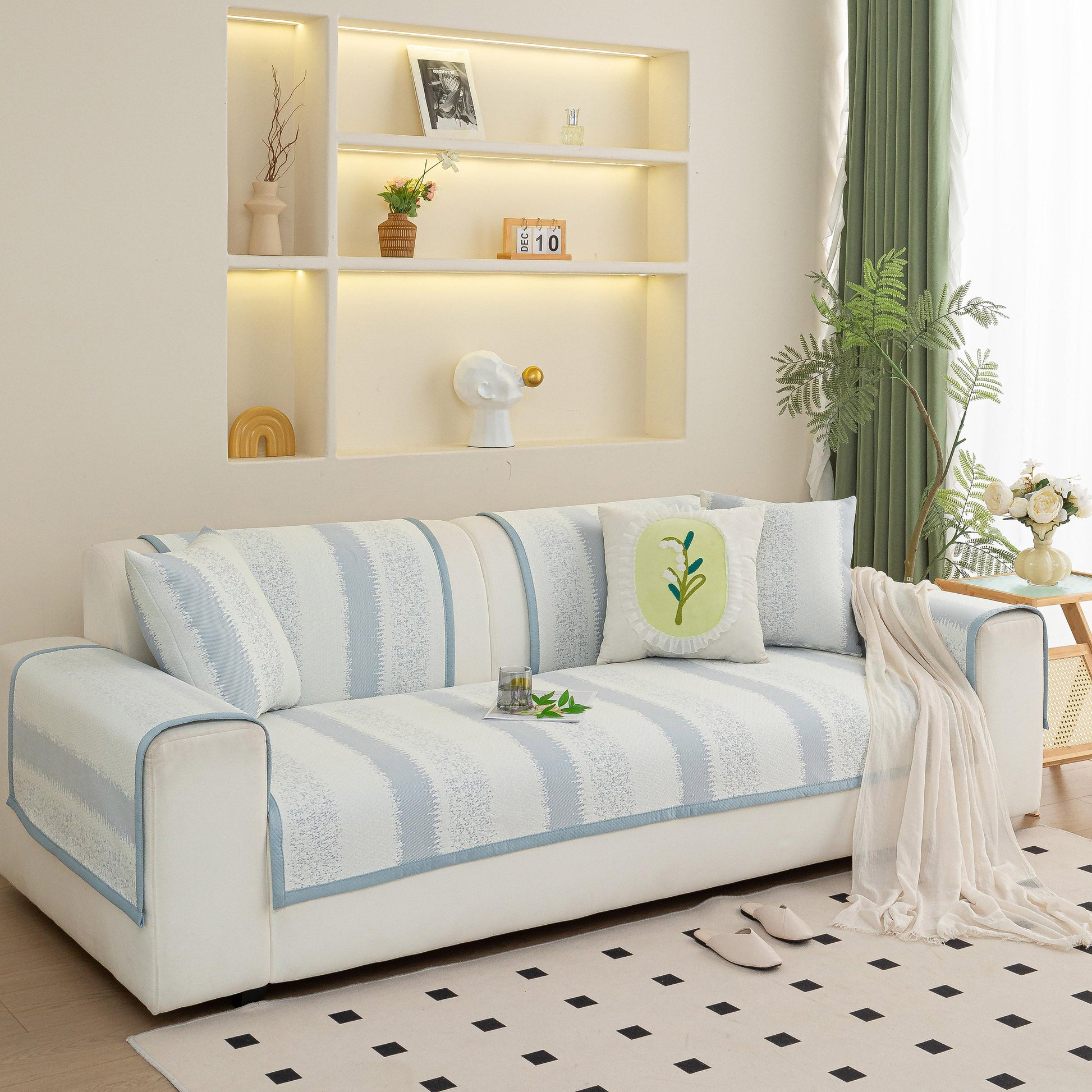 Striped Non-Slip Cooling Couch Cover on a sofa in a cozy living room setting, showcasing summer couch pads for seat back armrest.