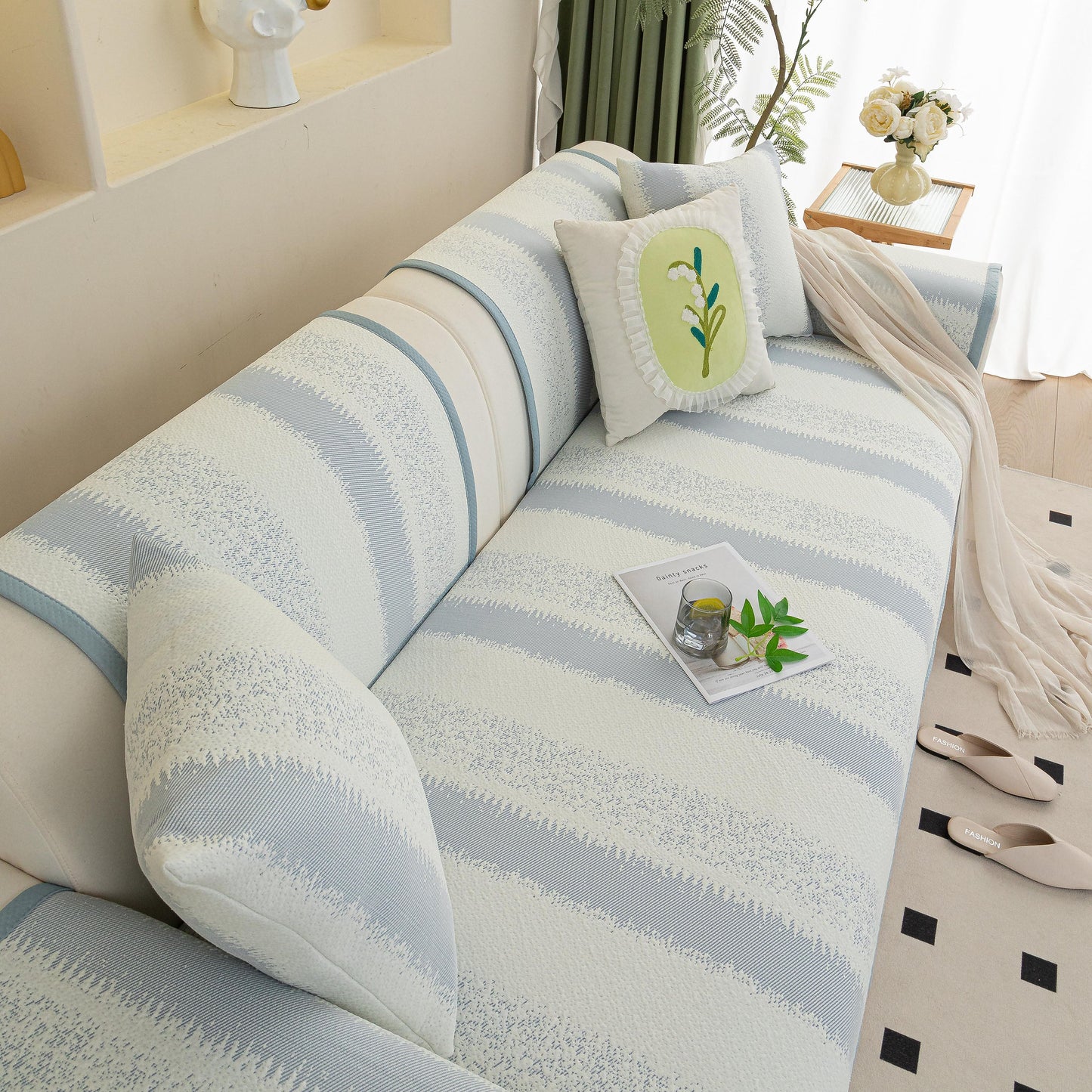 Striped Non-Slip Cooling Couch Cover, Summer Couch Pads for Seat Back Armrest in stylish living room setting with decorative pillows.