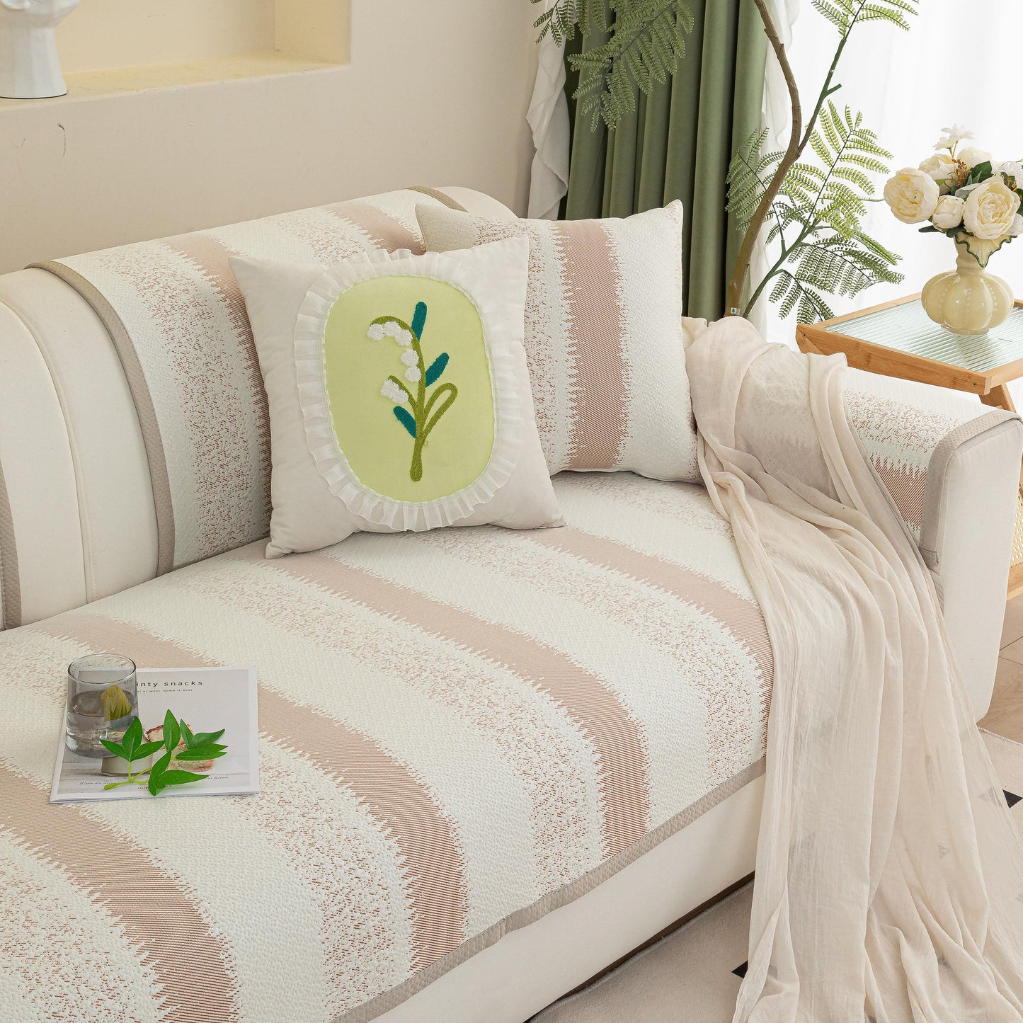 Striped Non-Slip Cooling Couch Cover, Summer Couch Pads for Seat Back Armrest on a sofa with floral pillow and decor