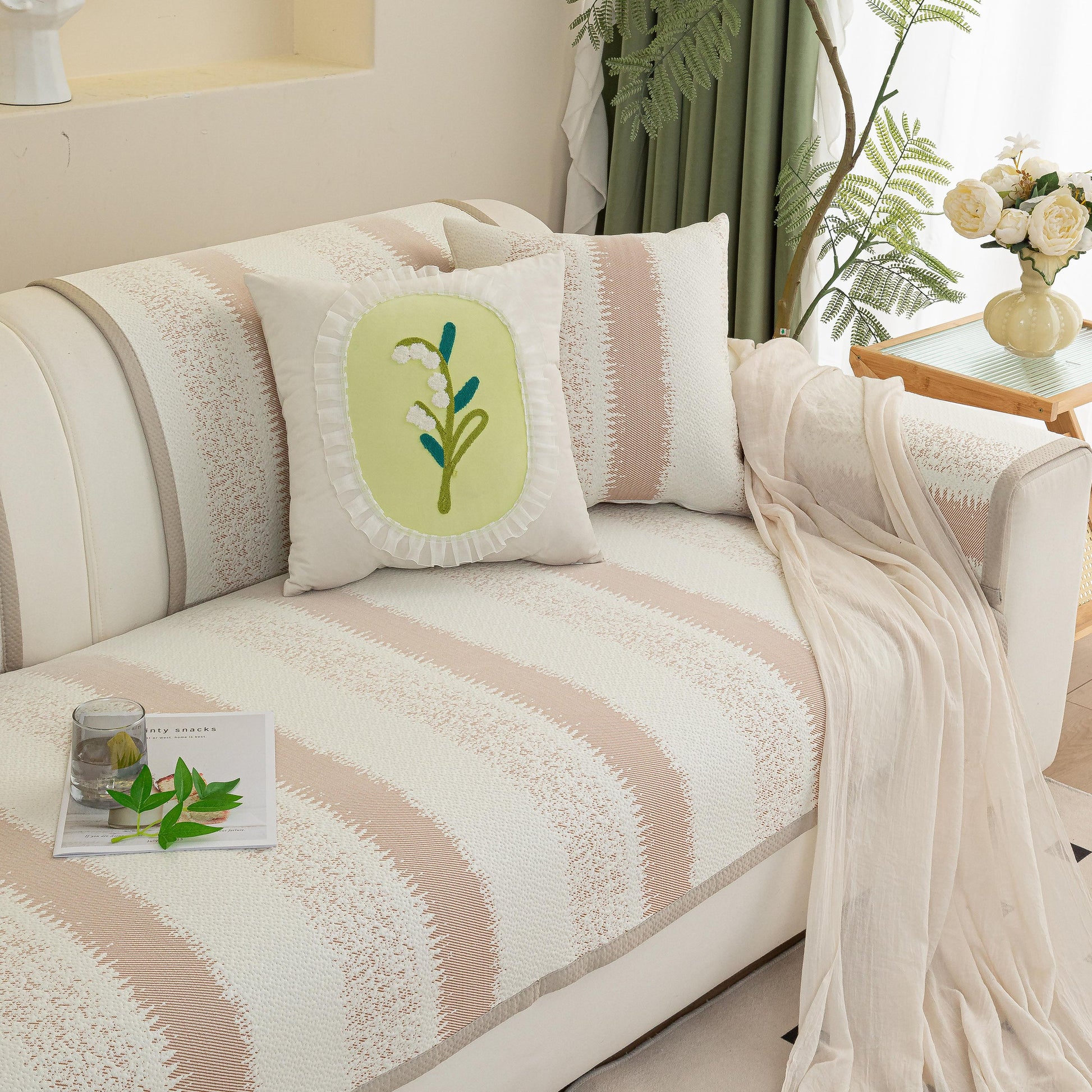 Striped Non-Slip Cooling Couch Cover, Summer Couch Pads for Seat Back Armrest on a sofa with floral pillow and decor