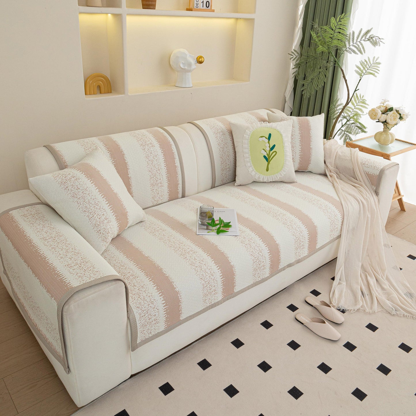 Striped Non-Slip Cooling Couch Cover, Summer Couch Pads for Seat Back Armrest on a modern sofa in a cozy living room setting
