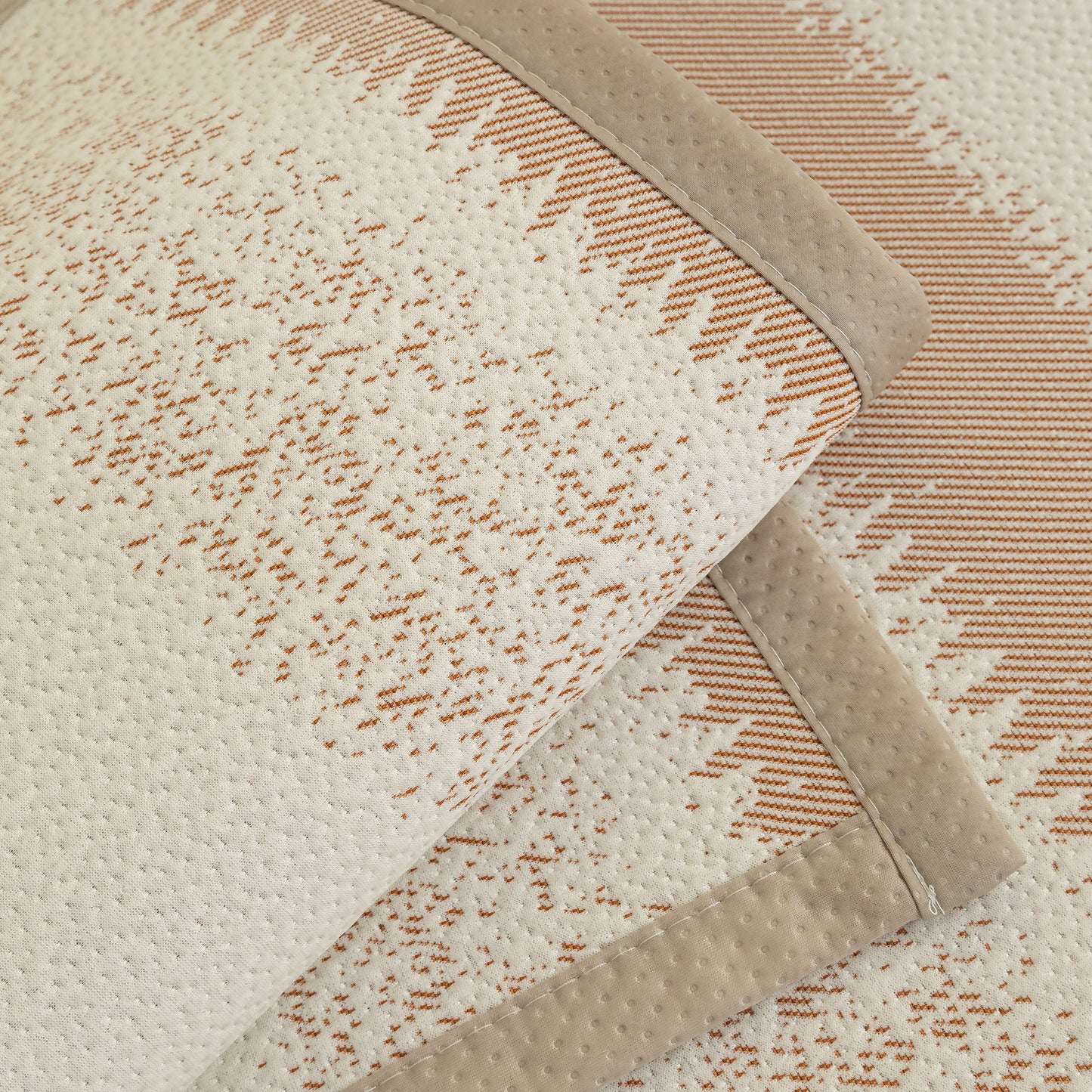 Close-up of Striped Non-Slip Cooling Couch Cover, Summer Couch Pads for Seat Back Armrest with breathable fabric and rubber granules.