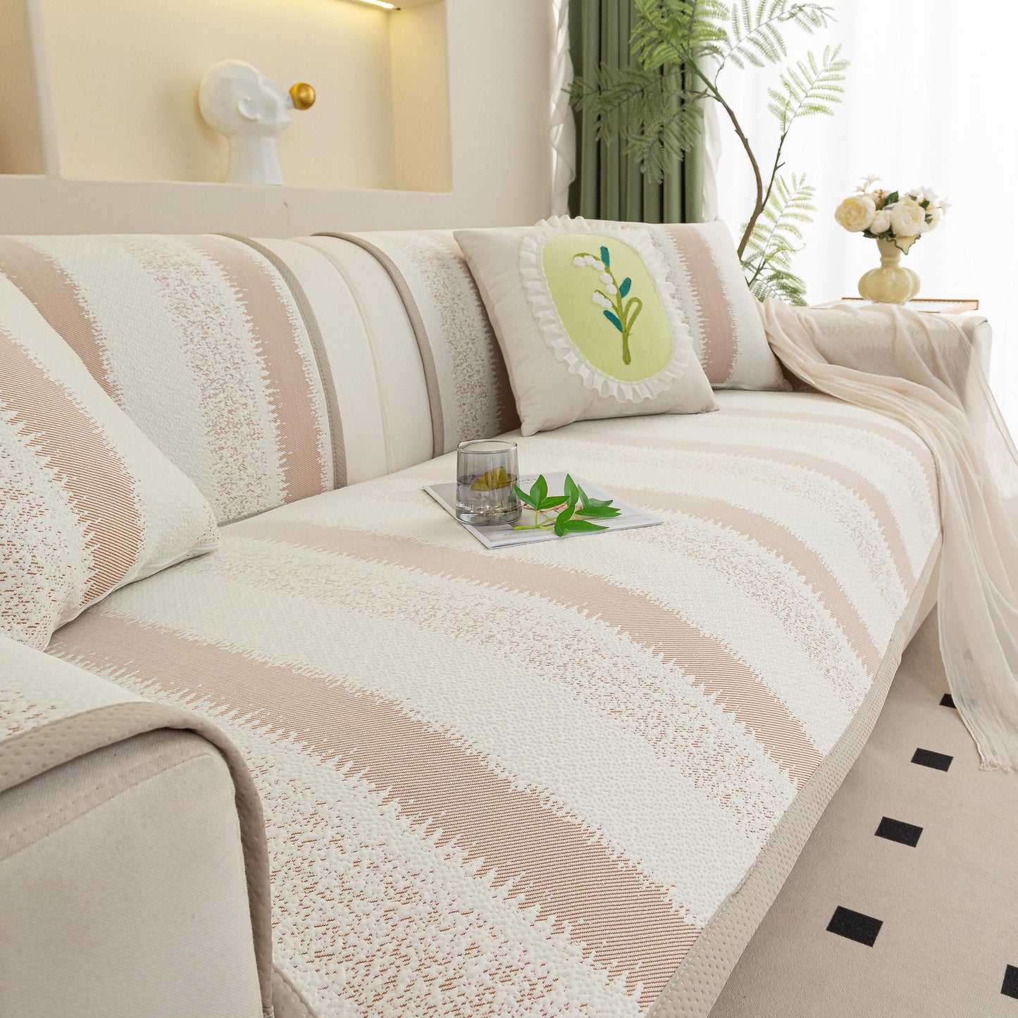 Striped Non-Slip Cooling Couch Cover, Summer Couch Pads for Seat Back Armrest on beige sofa with decorative pillows.