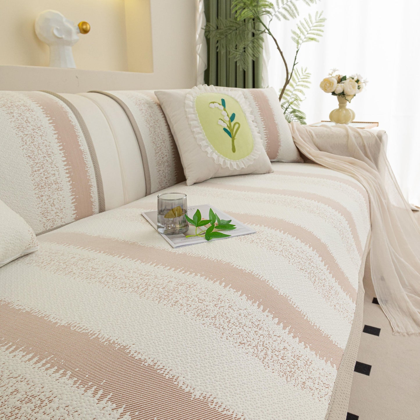 Striped Non-Slip Cooling Couch Cover, Summer Couch Pads for Seat Back Armrest on a stylish sofa setting.
