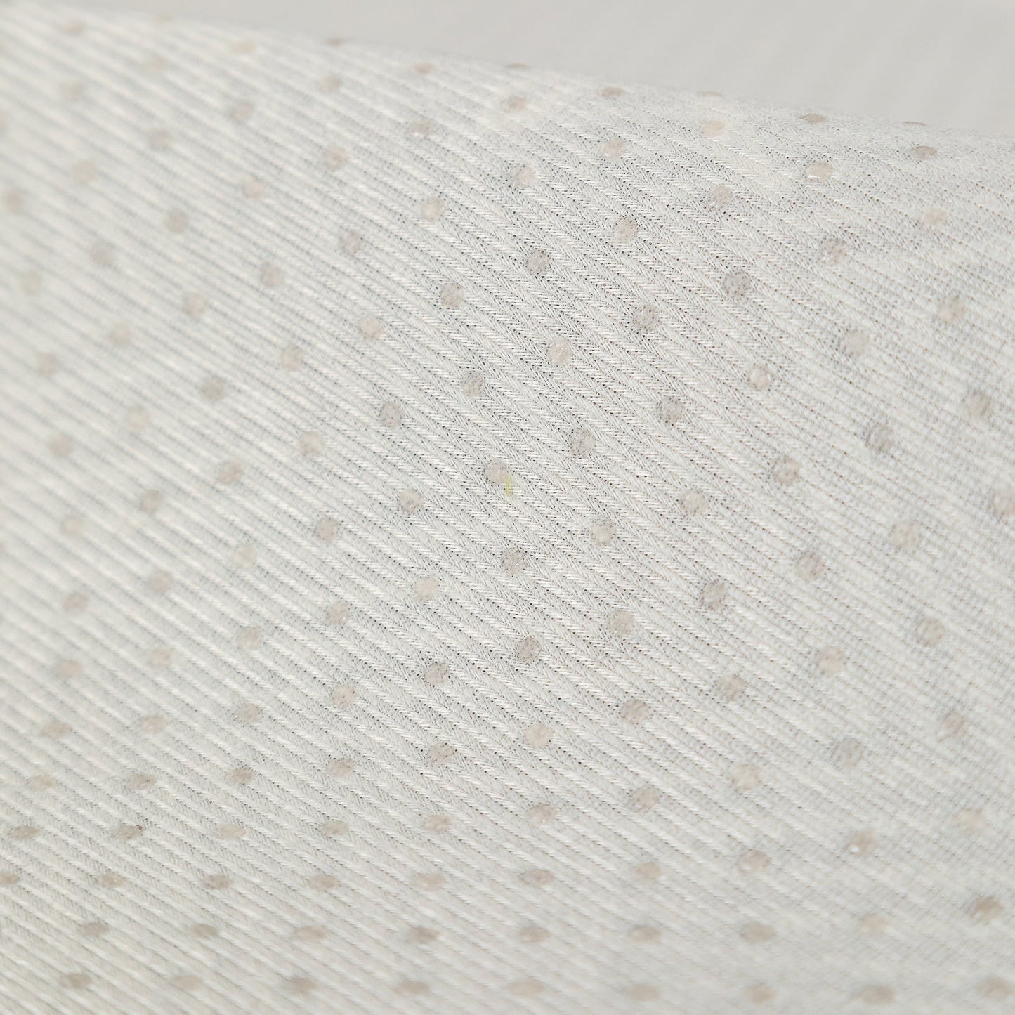 Close-up of silicone anti-slip backing on Sofa Cover for Leather & Fabric Couches, 3D Leaf Embossed Quilted Furniture Covers.