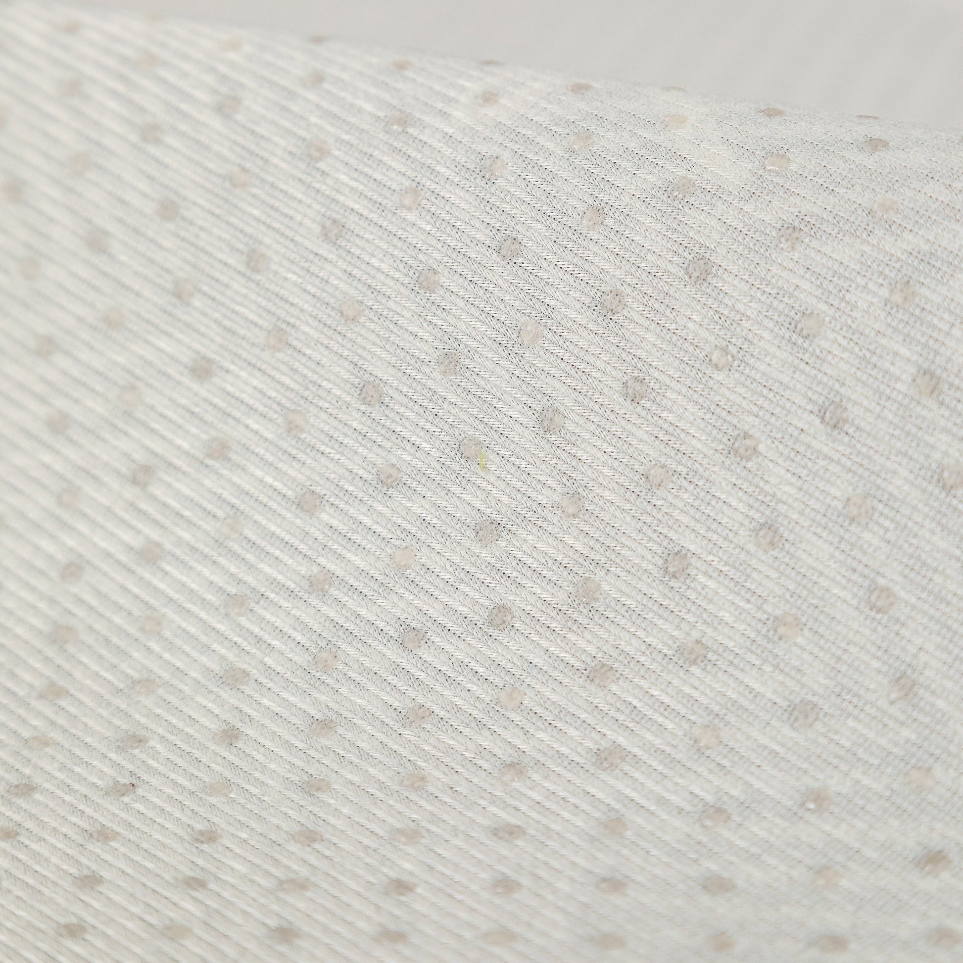 Close-up of silicone anti-slip backing on Sofa Cover for Leather & Fabric Couches, 3D Leaf Embossed Quilted Furniture Covers.