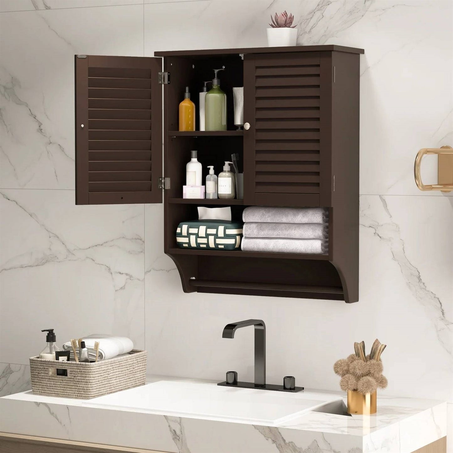 Brown Wall-Mounted Bathroom Medicine Cabinet with Louver Doors and Towel Bar above a bathroom sink with towels and toiletries.
