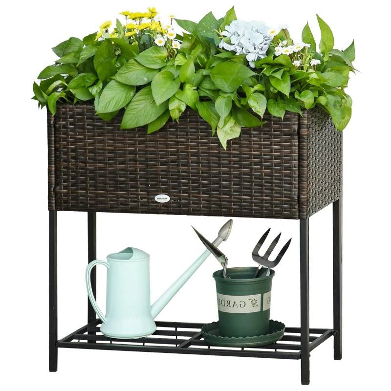 Brown Modern PE Rattan Wicker Raised Garden Bed Elevated Planter Box with plants and gardening tools