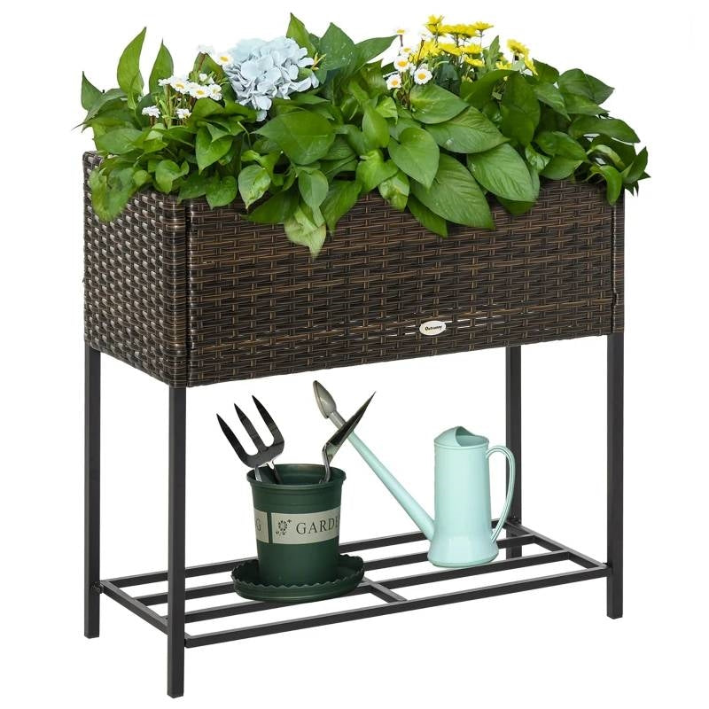 Brown Modern PE Rattan Wicker Raised Garden Bed Elevated Planter Box with plants and gardening tools on display