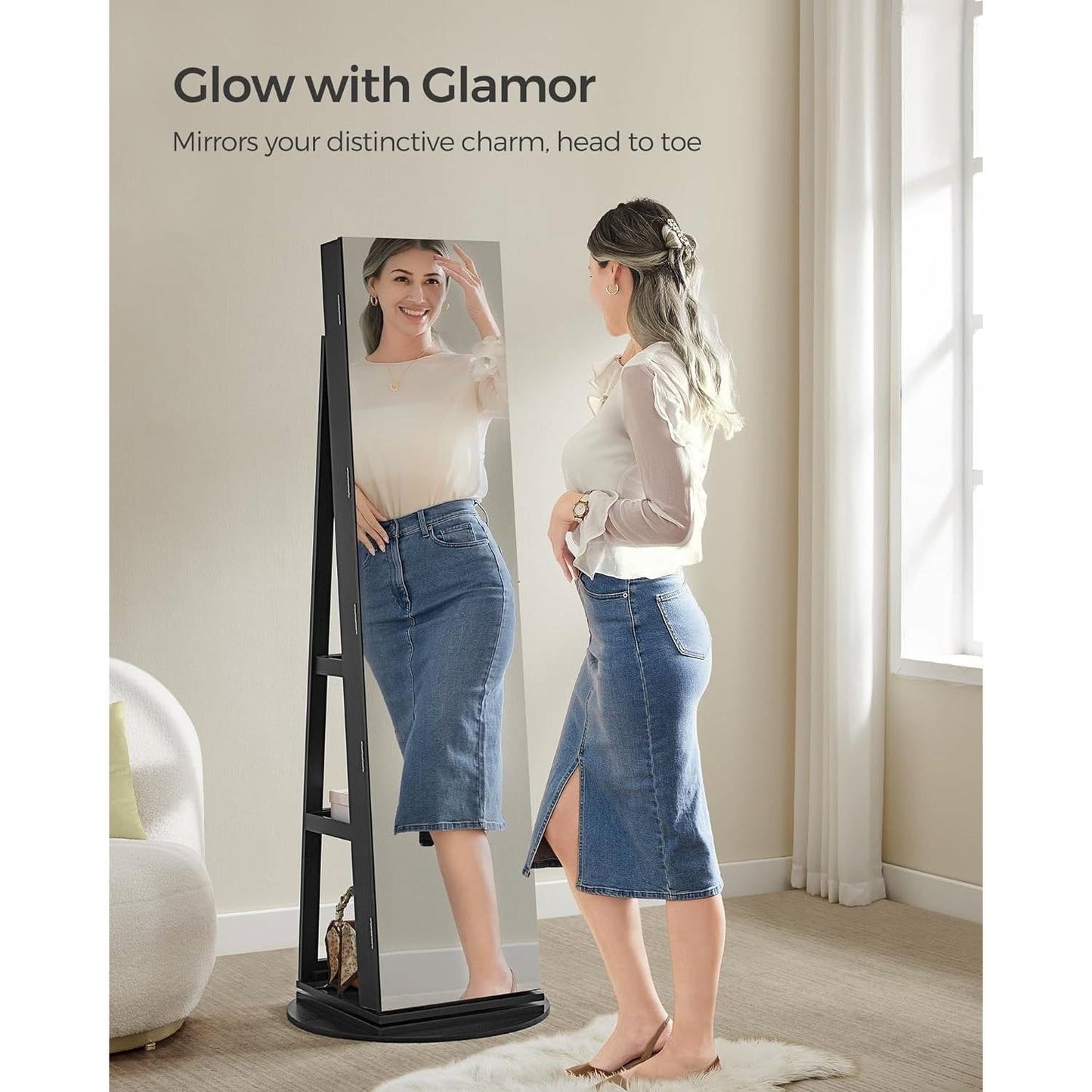 Woman using Black Wood Jewelry Cabinet Armoire Organizer Freestanding Rotating Mirror for full-length view in living room