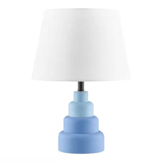 Small Blue Desk Light Table Lamp with White Fabric Shade for Bedside Nightstand with grey resin base.
