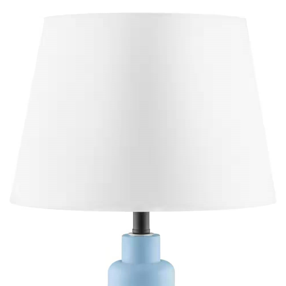 Small Blue Desk Light Table Lamp with White Fabric Shade for Bedside Nightstand with grey resin base and modern design.