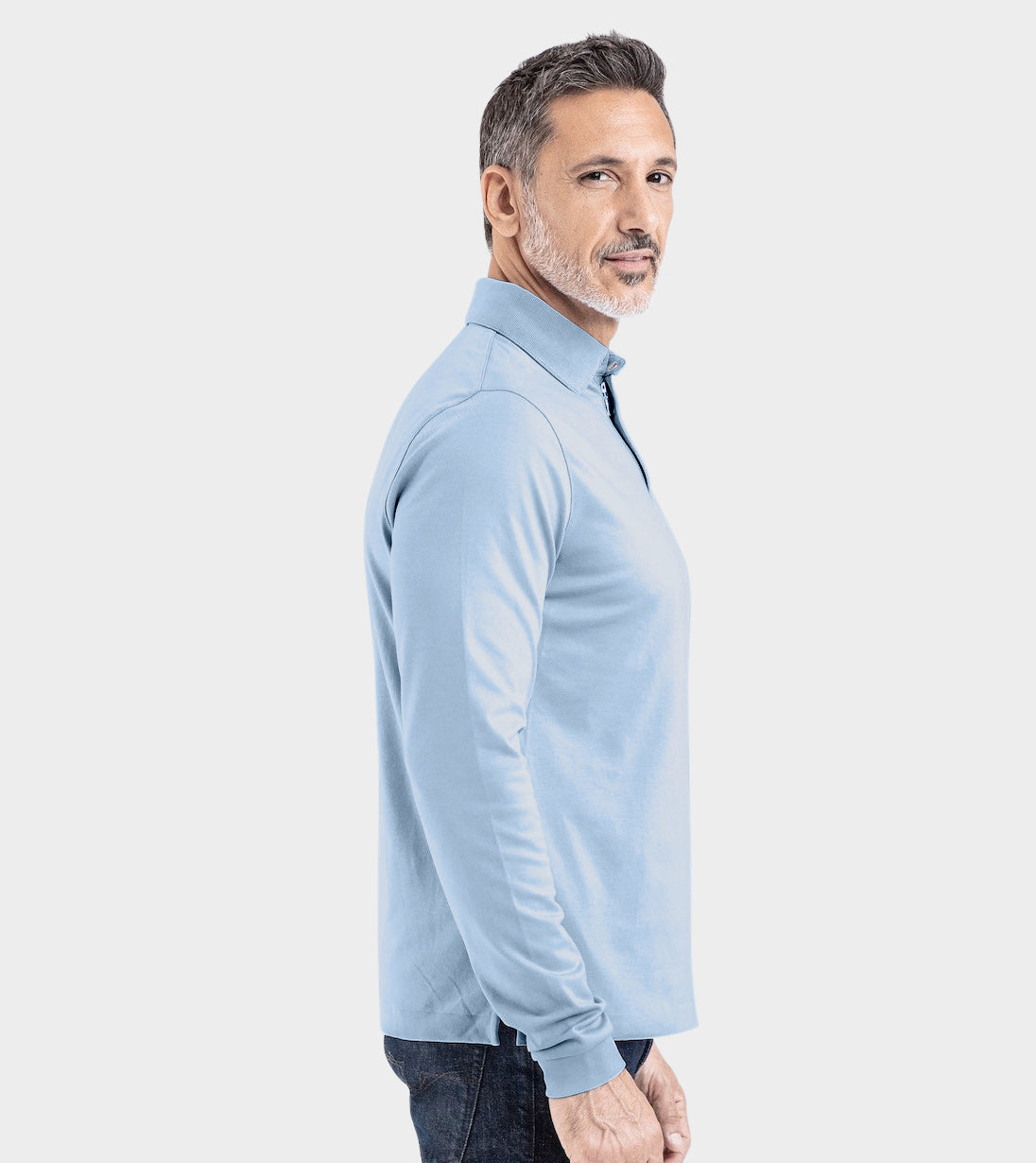 Man wearing blue Long Sleeve Perfect Polo showcasing tailored fit and StaySharp™ Collar for a refined look.