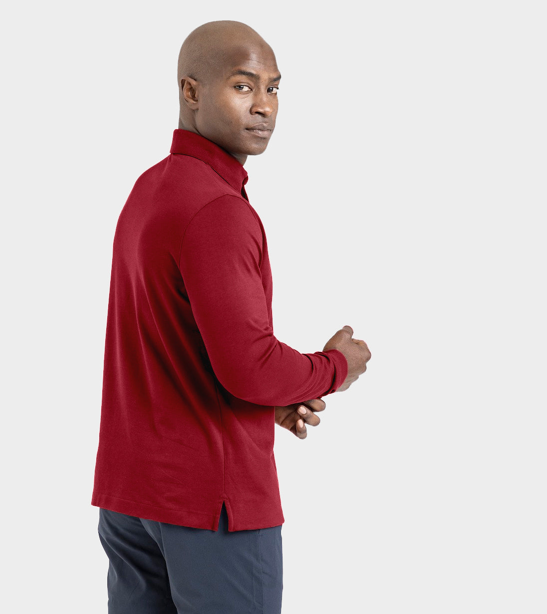 Man wearing a red Long Sleeve Perfect Polo with StaySharp™ Collar in side view.