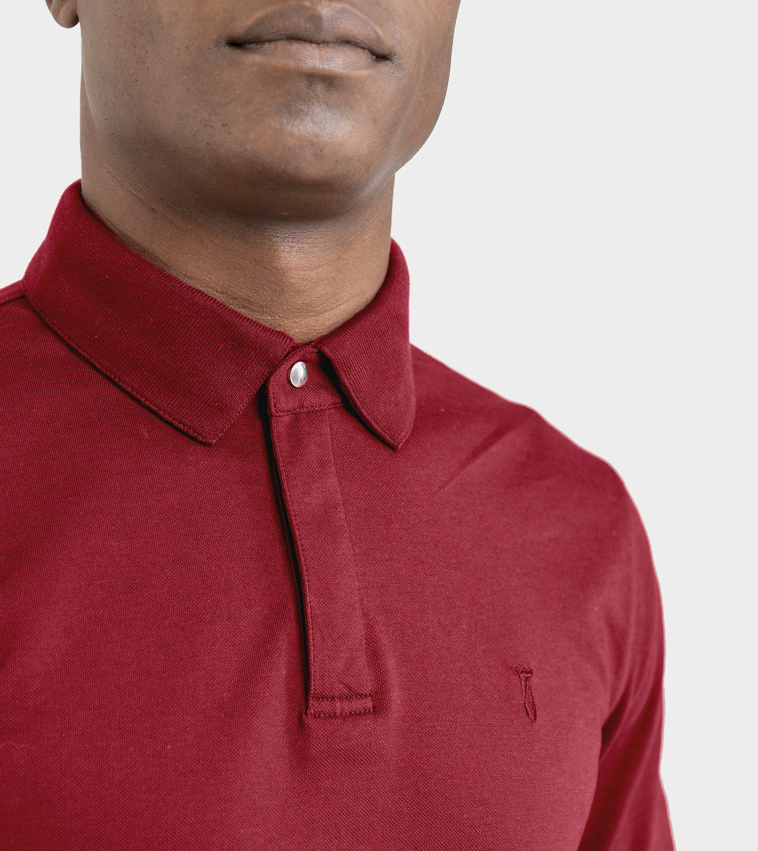 Close-up of Baobab Long Sleeve Perfect Polo in red with StaySharp™ Collar