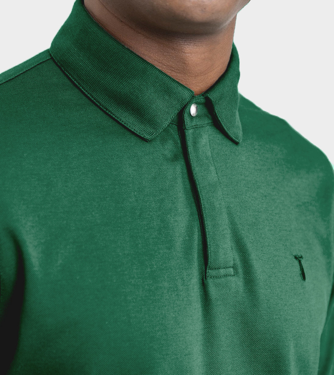 Man wearing green Long Sleeve Perfect Polo with StaySharp™ collar showcasing hidden snaps for crisp look and microfiber cloth feature.