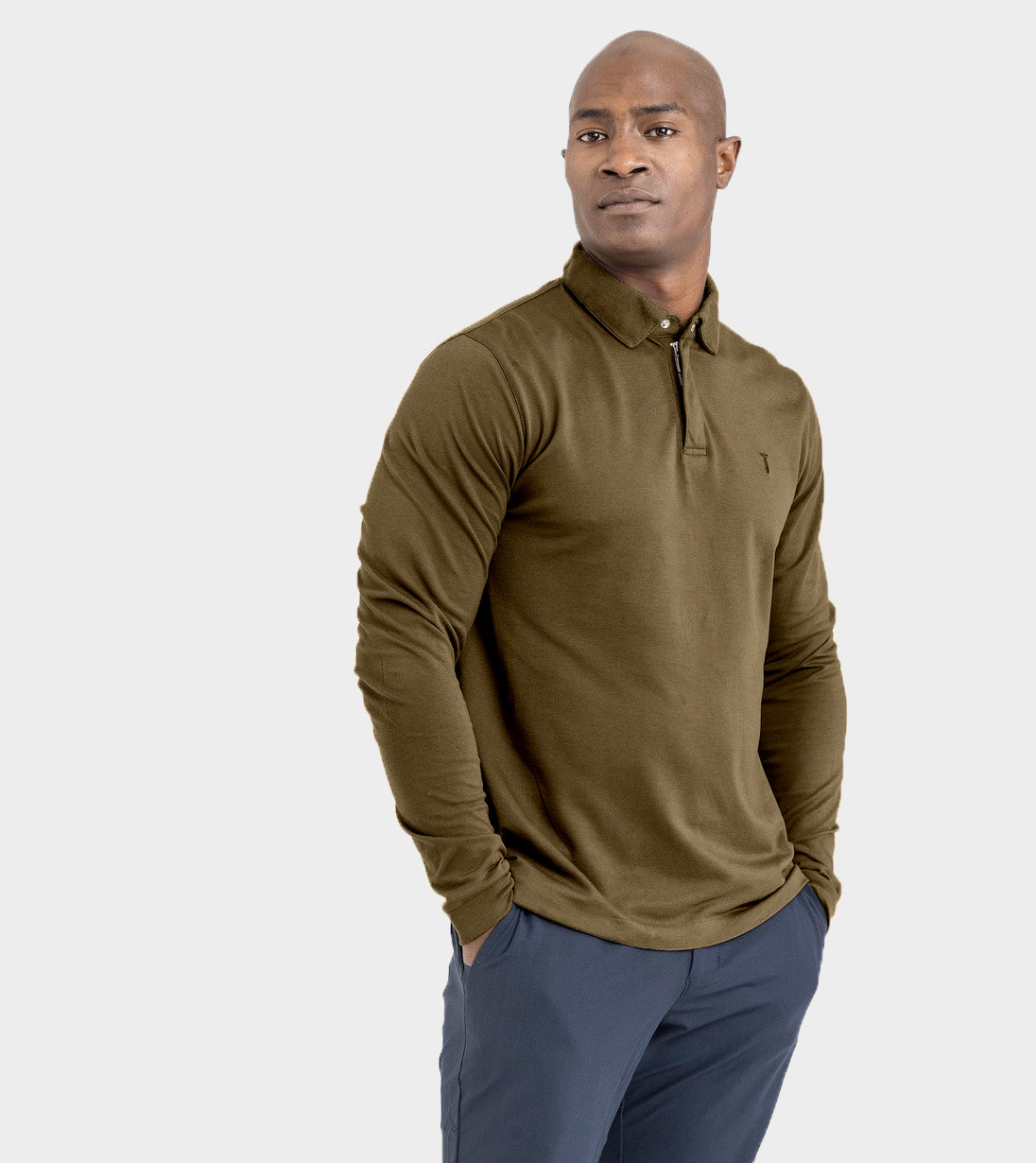 Model wearing Long Sleeve Perfect Polo in olive green, featuring StaySharp™ Collar and tailored fit. Ideal for cooler days and performance.