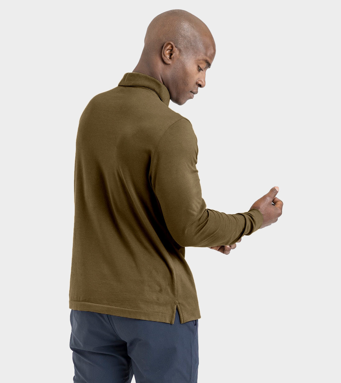Model wearing Long Sleeve Perfect Polo with StaySharp™ Collar, featuring discreet microfiber cloth for glasses and screens cleaning.